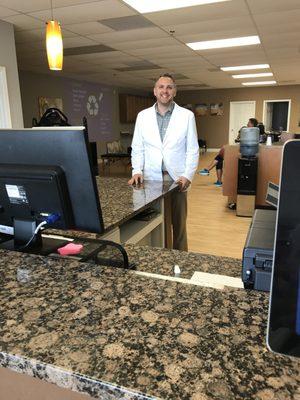 Dr. Sharpe at the front desk.