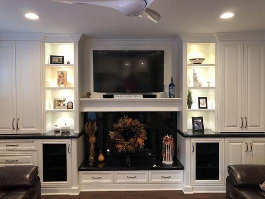 Built in cabinets around a fireplace