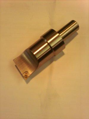 Custom tooling used in the CNC mill for valve seat cutting