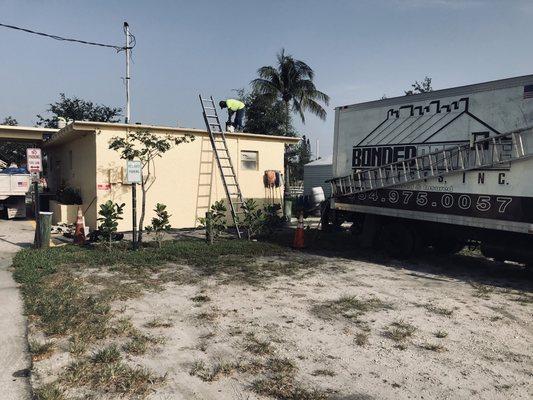 Re-roof Project American Legion club Pompano Beach total terror off John Mannsville NDL 20 year roof system going back.