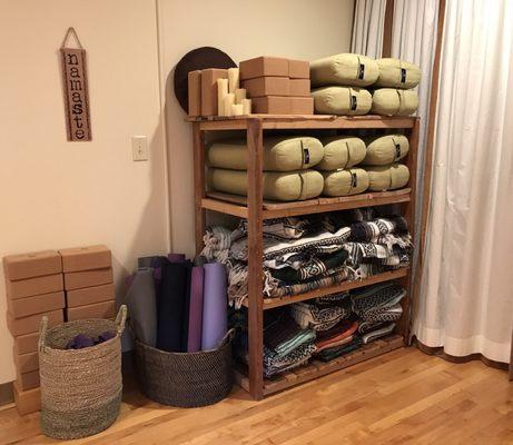 Our studio is fully propped.  We offer free use of yoga mats, bolsters, straps, cork blocks, mexican blankets, sand bags & more.