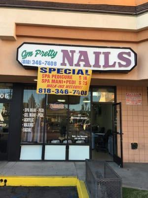 Store front, front of nail salon. Great place reasonable prices and awesome customer service.