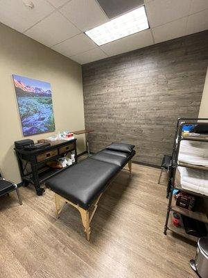 Warm, calming exam rooms designed to put you at ease at Pinecone Physio.