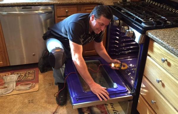 Eric repairing an oven. Call for appliance repair in Horsham PA.