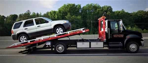 If you're stranded, call Advanced Car Care, we provide 24/7 roadside assistance and damage-free flatbed towing.