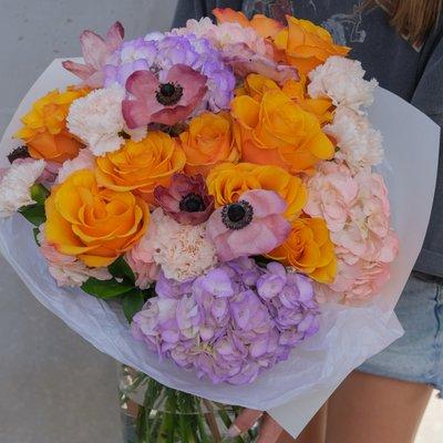 Apricots & Berries with roses, purple hydrangea, carnations & anemone.