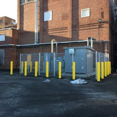 Complete packaged outdoor substation with low voltage walk-in enclosure; Inter-connected loads via cable tray.