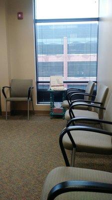 Ample seating in the waiting room.