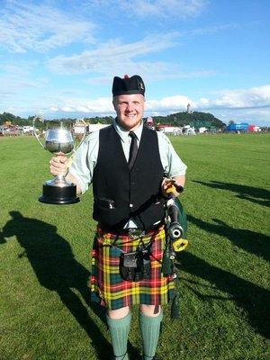 Daniel Relihan competing with the Chicago Stockyard Kilty Band in the Bridge of Allen Highland Games in Scotland, 2013