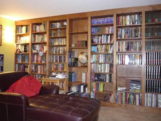 Custom design & build floor-to-ceiling bookcase.