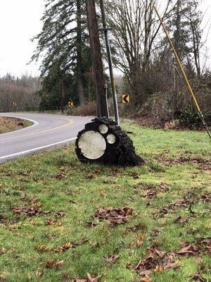 This is the sign on the road! It's easy to miss.