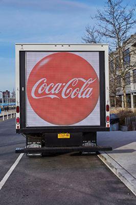 LED Mobile Billboard Truck provided by American Guerilla Marketing. Coca Cola Campaign