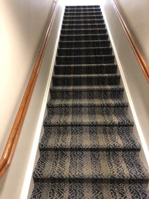 Golf Club 10 yr old glued carpet removal before installation of new plush, patterned Stanton carpet.