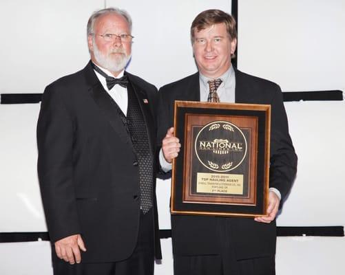 2011 Annual National Van Lines Convention. Bradley Sr, accepting our award for 2nd place for Top Hauling Agents!