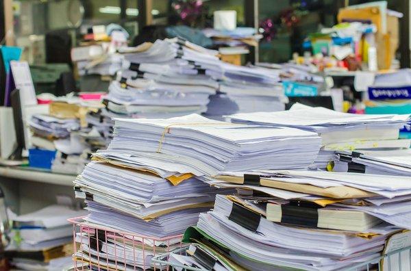 Old stacks of paperwork ready to be recycled