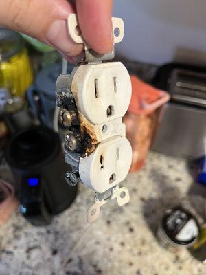 Melted wall socket