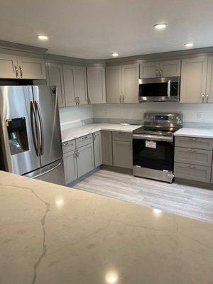 Remodel kitchen from house fire .