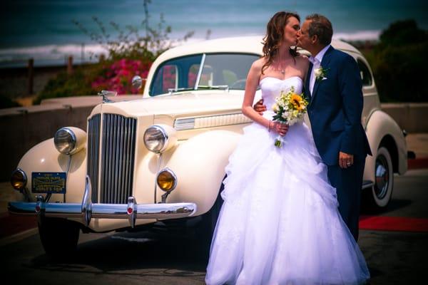 San Clemente beach wedding couple with 1939 American Rolls Royce Packard by Lake Forest limos 2013