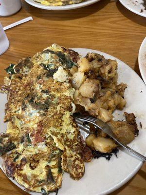 Popeyes omelette was yummy! The home fries was the way I like it... very good!