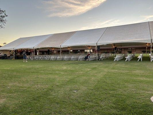 Christmas Eve service under the tent on church lawn