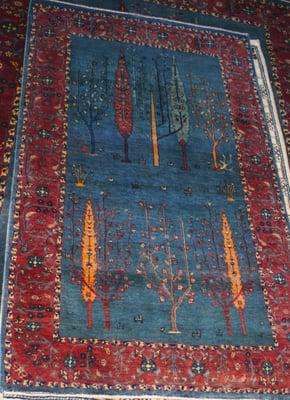 Beautiful gabbeh rug with trees.