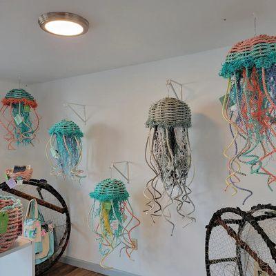 Recycled crab pot line reimaginged as jellyfish, baskets and Dungeness doormats.