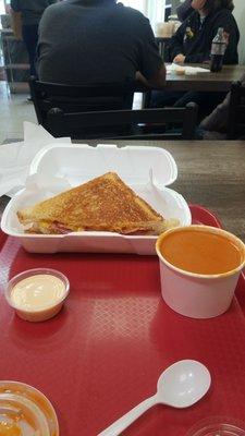 #3 grilled cheese, ham, bacon, american and cheddar cheese, tomato soup and special sauce.