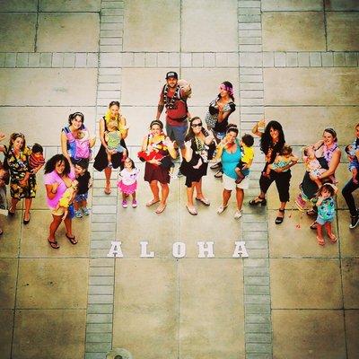 Gathering with moms and babies at the Hawaii State Capitol to lobby for improvements to laws protecting mothers from discrimination