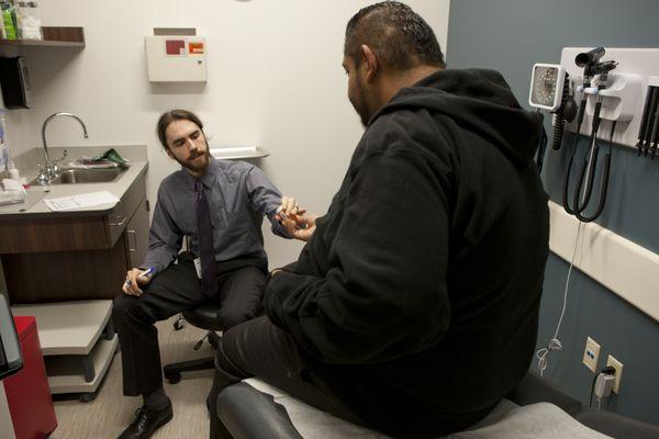 Clinical Pharmacist Zach Rosko provides medication reconciliation support for patients