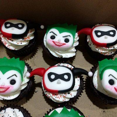 Joker and Harley themed cupcakes for my nephew's 10th birthday. Chocolate with vanilla frosting.