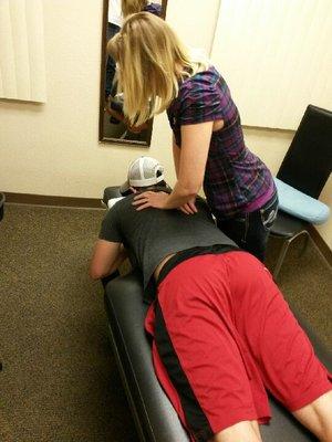 Dr. Ferguson performing a thoracic adjustment