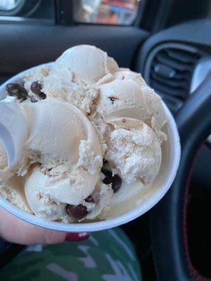 Large cup with a scoop of coffee bean, coconut almond & coffee oreo