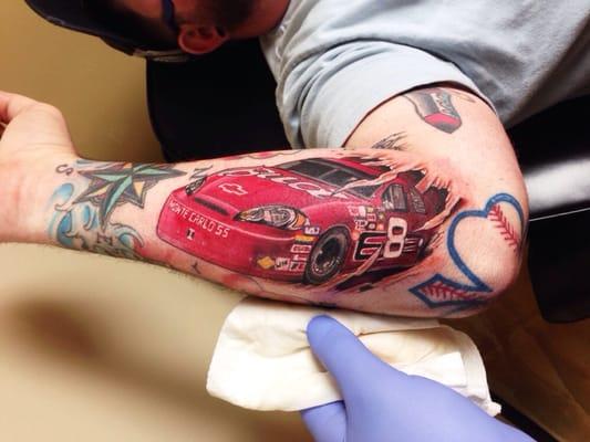 Full color NASCAR tattoo, done by Squablo. Custom tattoos for everyone, of every style.