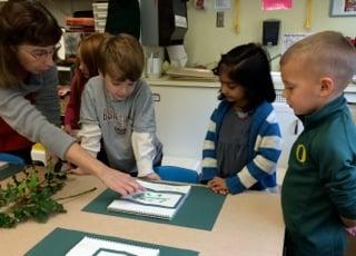 Kindergartners during  art lesson.