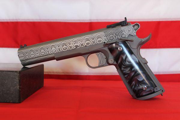 Custom Built 1911 pistol with Damascus slide.