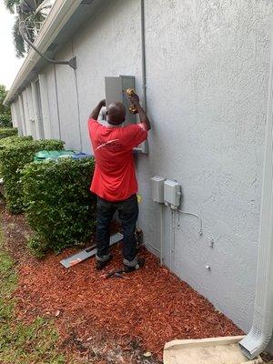 Joe the electrican fixing outside fuse panel at my Coral Springs Home