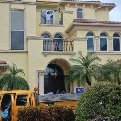 Plastering the third floor perimeter wall in Fort Lauderdale  FL