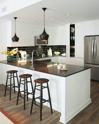 Chef-Inspired Kitchens Featuring Tom Dixon Pendant Lighting, Italian Rifra Cabinetry and Sleek Quartz Countertops