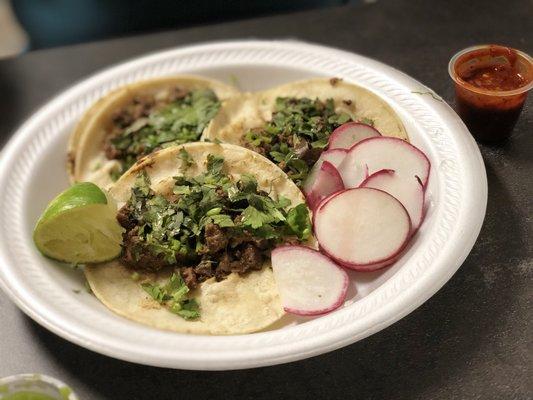 An order of Mexican tacos. This order was asked for with no onions.