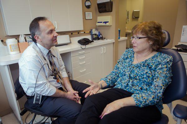 Dr. Ricciardi helping a patient