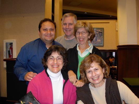 Spanish tutor and four of his Spanish students in a small group class