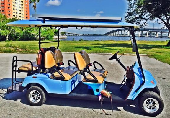 Meet Blue Beauty. A 6 passenger open air electric street legal golf cart. Solar panel to give us more juice