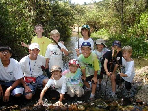 Boys having fun in the creek