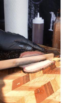 Slicing brisket , beautiful smoke ring