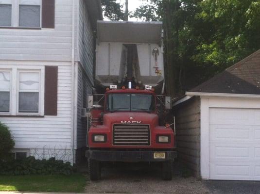 Tight spaces. No problem for Congdon lumber. Up to 21 tons delivered per trip