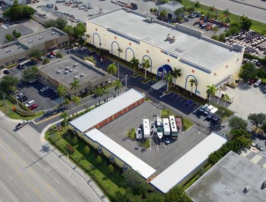 Aerial view of facility, featuring brand new drive up units and parking.