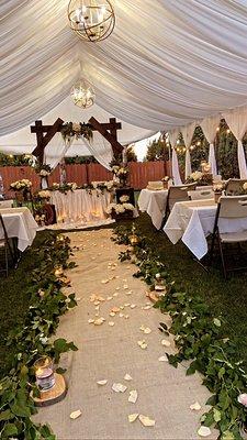 Gorgeous  decorated canopy 20 x 30 and chandeliers  Lights up so well and we added two heaters which was enough to keep the space warm