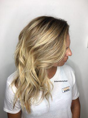 Color correction: removal of box color over her highlights using a balayage technique.