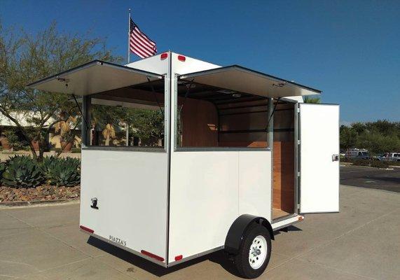 10' custom vending trailer with three 72"x30" windows. Call us to book a vending trailer for rent!