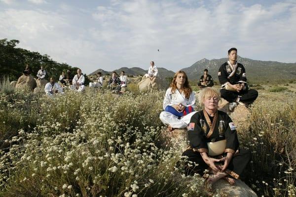 Instructors and Students practicing Nae Shim Gong Meditation techniques at a Weeklong Seminar in California.